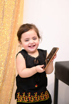 Mirha’s Black Suit